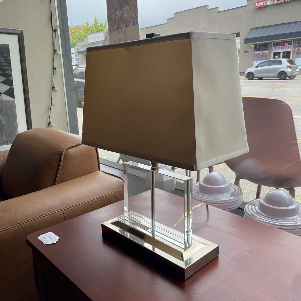 Table lamp with a rectangular shade and a clear acrylic base