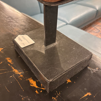 Rustic Wood Wheel Mounted On Black Stand