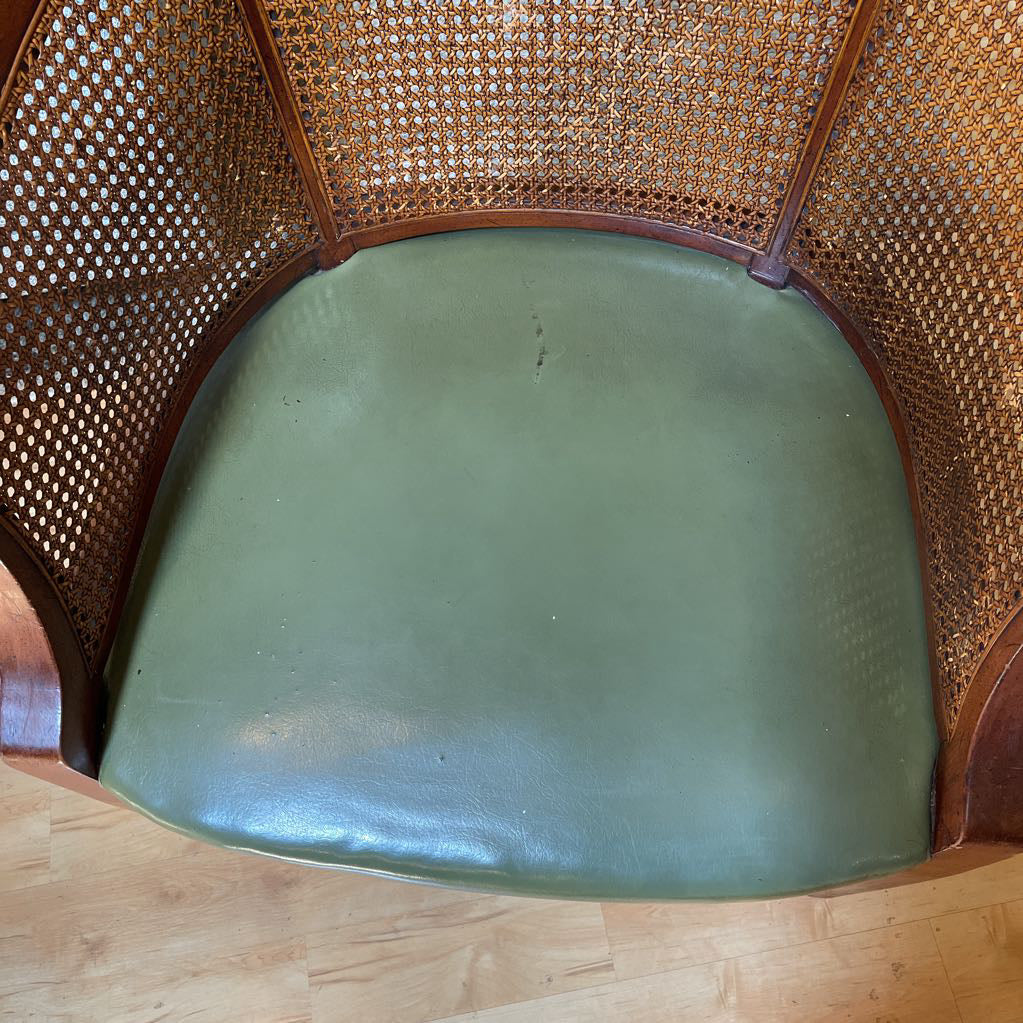 Cane Curved Back Green Leather Accent Chair