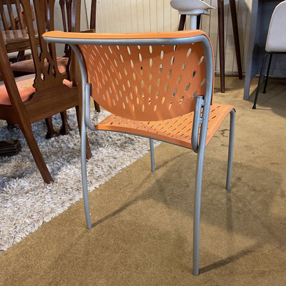 Orange Molded Plastic Chair with Grey Legs