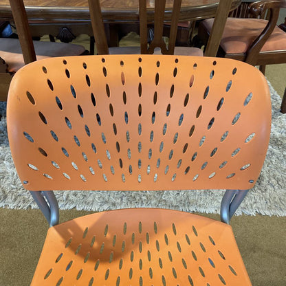 Orange Molded Plastic Chair with Grey Legs
