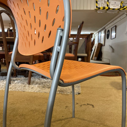 Orange Molded Plastic Chair with Grey Legs