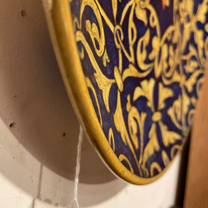 Blue Plate with Dark Gold/Yellow Pattern and Center Flower Detail