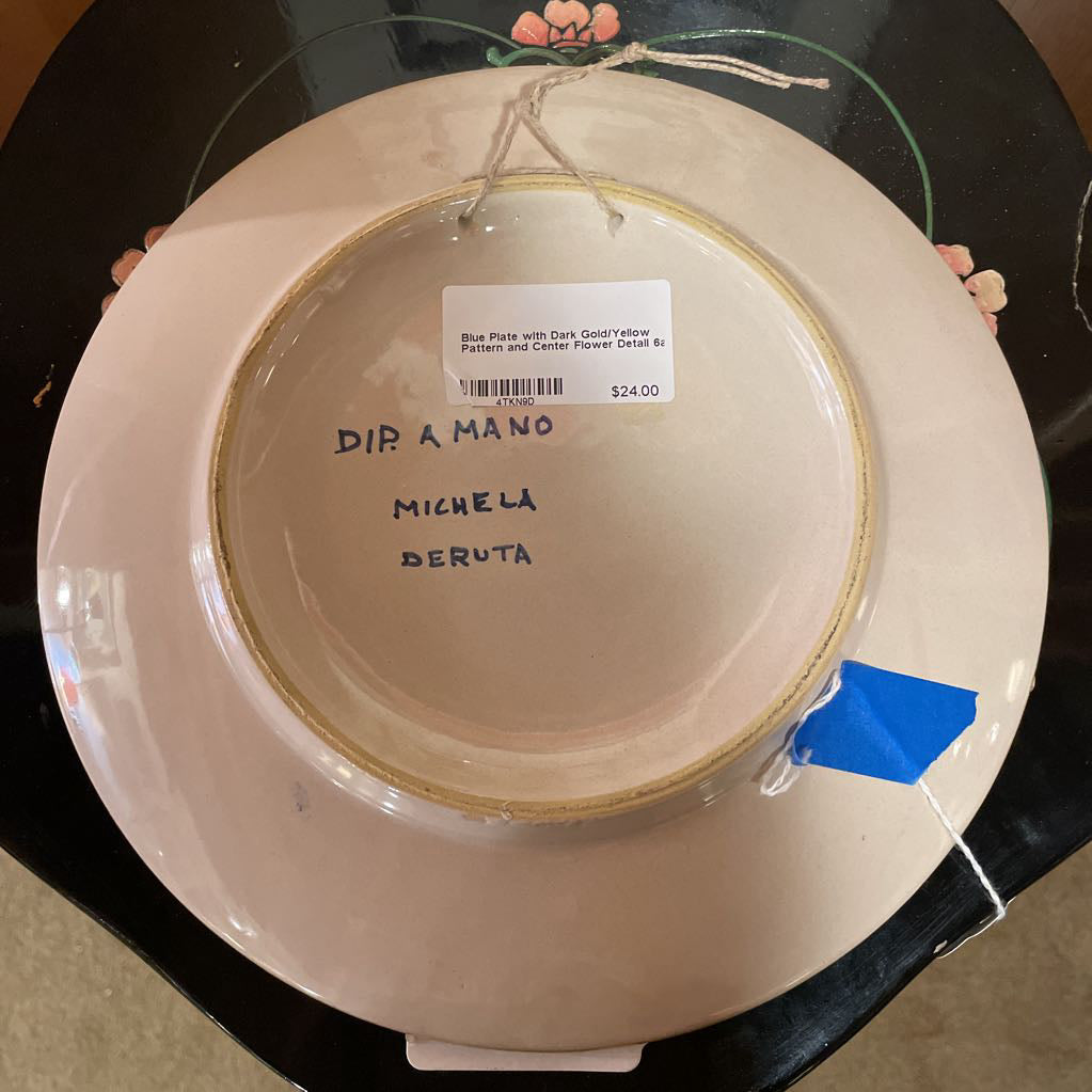 Blue Plate with Dark Gold/Yellow Pattern and Center Flower Detail
