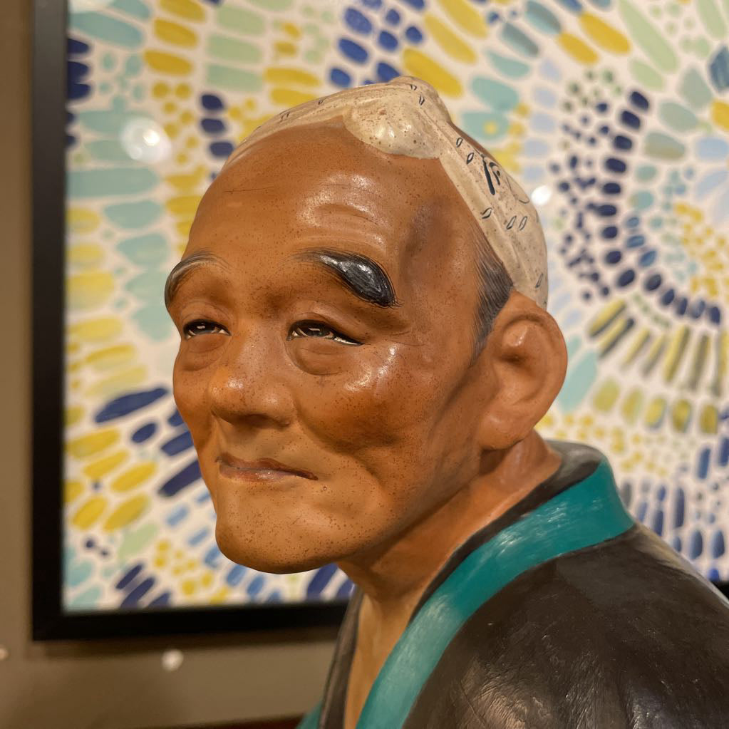Japanese Seated Fishing Net Maker Statue