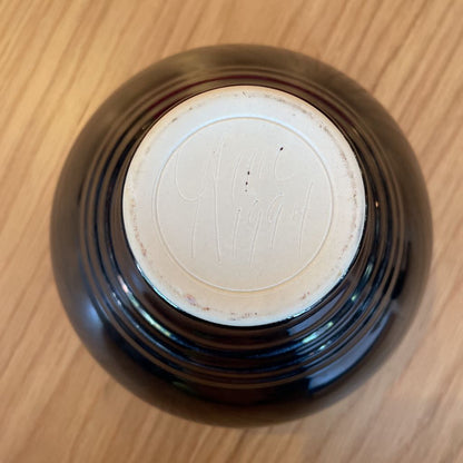 Black Vase with White and Blue Swirl Interior