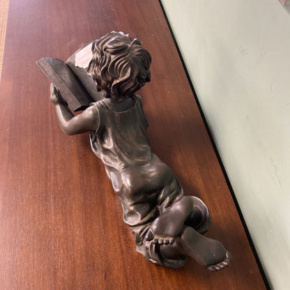 Child Reading Sculpture
