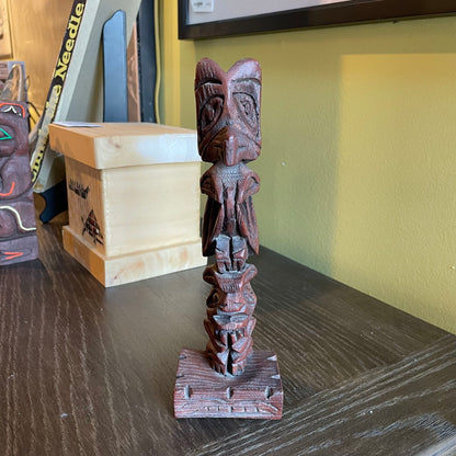 Creed Totems, Ak Totem Pole