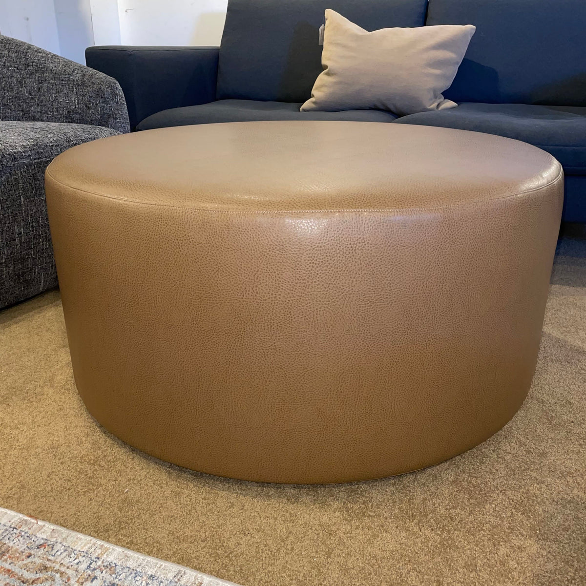 Round Faux Leather Ottoman U OTTOMANS