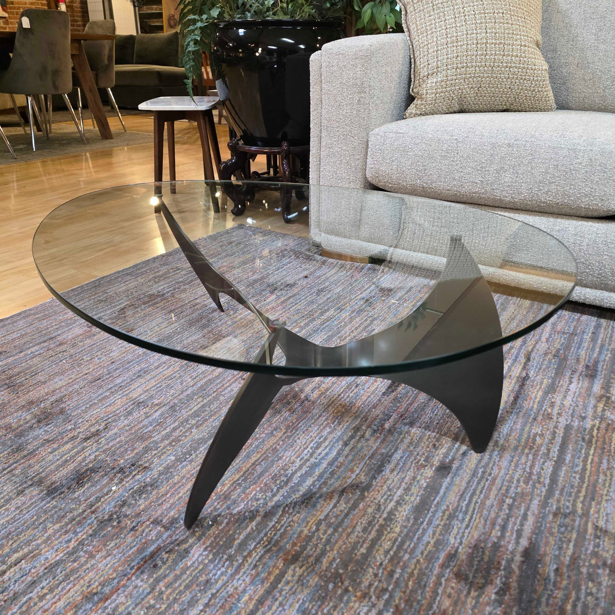 Metal Sculptural Base Egg Shaped Glass Top Coffee Table