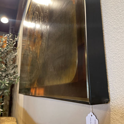 Large Metallic Art Featuring Wheel and Symbols