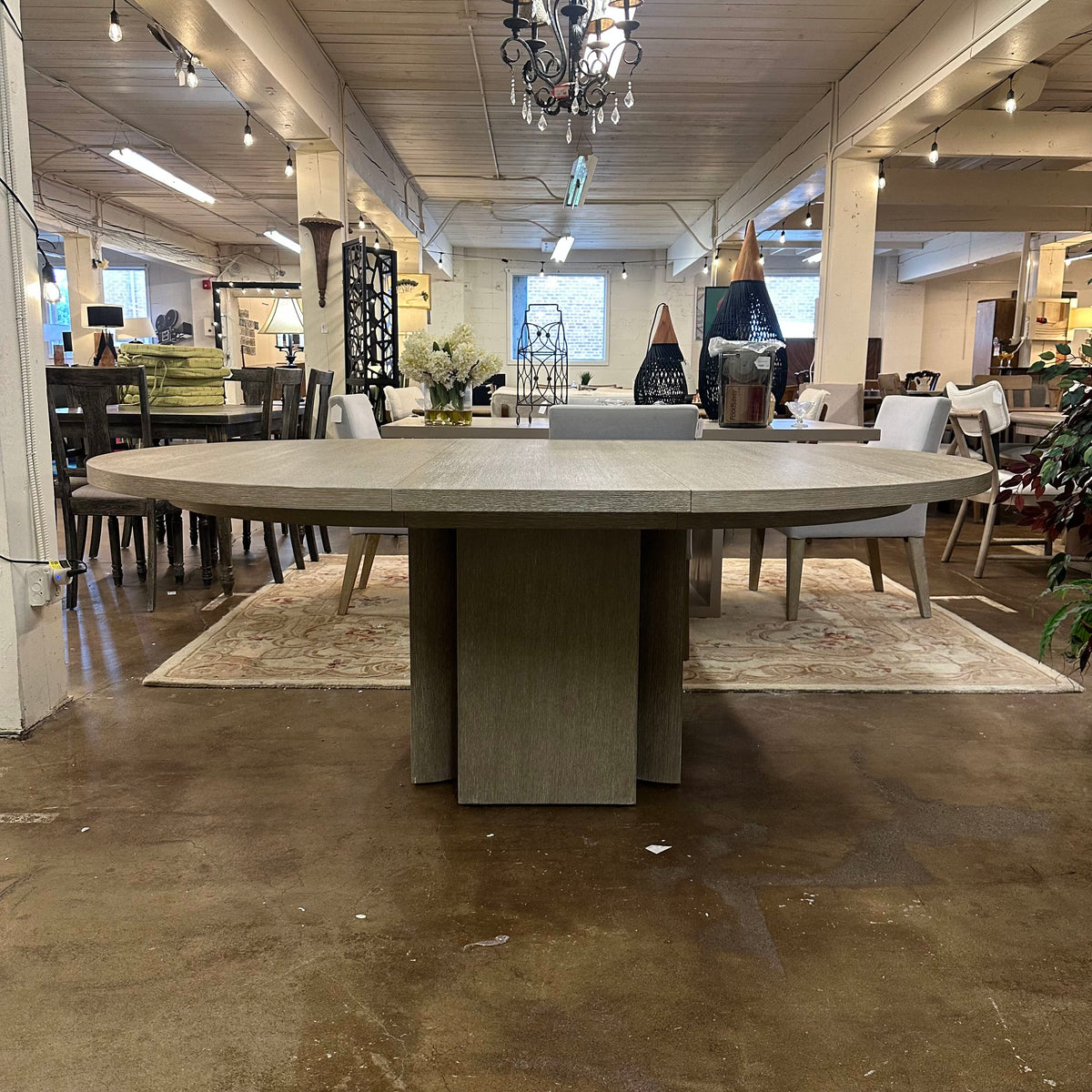 Bernhardt Loggia Round Dining Table with 20-Inch Extension Leaf in Aria Oak