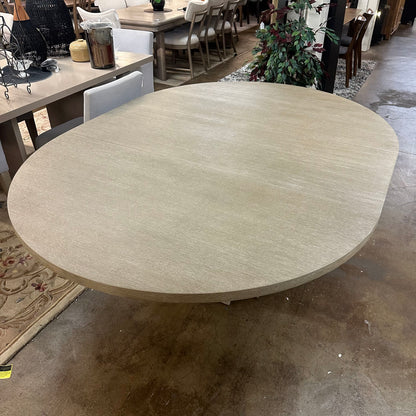 Bernhardt Loggia Round Dining Table with 20-Inch Extension Leaf in Aria Oak